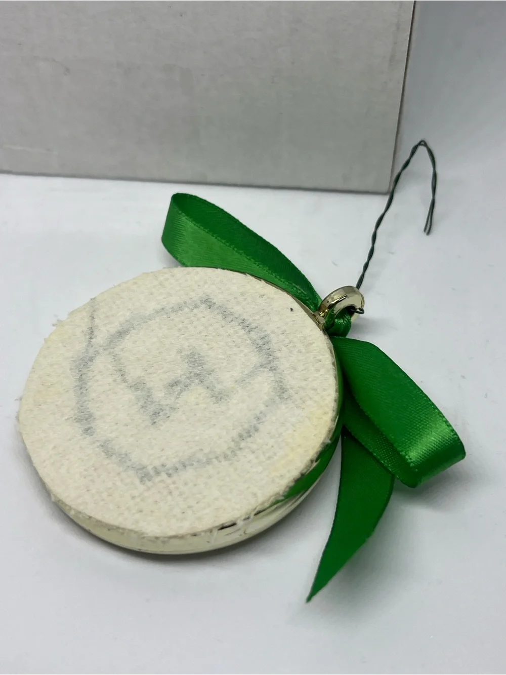 Hand Crafted Christ Is Born Cross-Stitched Holiday Ornament with Green Ribbon